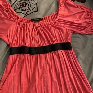 Pink Arden B shirt with black bow accent in front